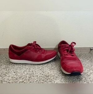 Men sports shoes in red leather